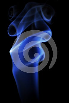 Photo of blue smoke on a black background