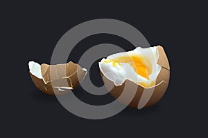 A photo of boiled smash broken hen beige egg isolated on dark blue. Egg`s liquid yolk photo, bright contrast.