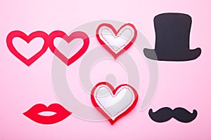 Photo booth colorful props for party with heart on pink background