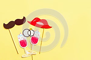 Photo booth props isolated on yellow background