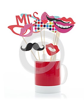 Photo Booth Props in a Red Mug