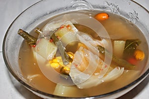 Photo of a bowl of vegetable soup ready to eat
