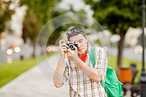 Photo of brunet with camera
