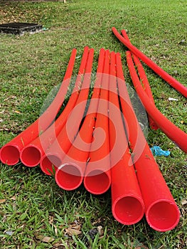 Photo of a bunch industrial undergroud upvc pipes. photo