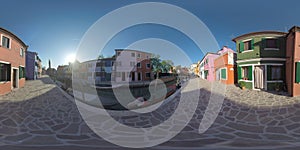 360 VR Traditional houses along canal and Leaning Bell Tower in Burano, Italy