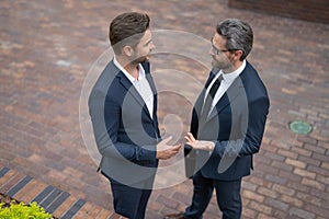 photo of business men coworker having conversation. business men coworker have conversation