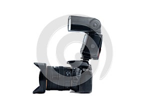 Photo camera and flash isolated on a white background. Copy space