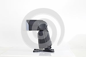 Photo camera flash on white background