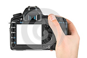 Photo camera in hand