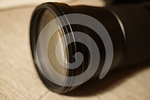 Photo camera lens closeup.