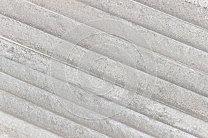 White slate texture. Slate background. Diagonal white-gray stripes. Abstraction. photo
