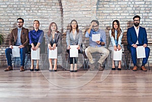 Photo of candidates waiting for a job interview