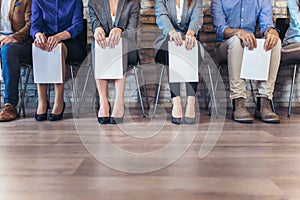 Photo of candidates waiting for a job interview photo