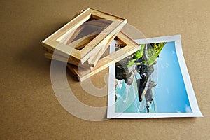 Photo canvas print and wooden stretcher bars on table. Landscape photography printed on canvas