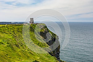 Photo capture of a breathtaking natural nature landscape. Cliffs of moher with O`brien`s tower, wild atlantic way. Ireland. Euro