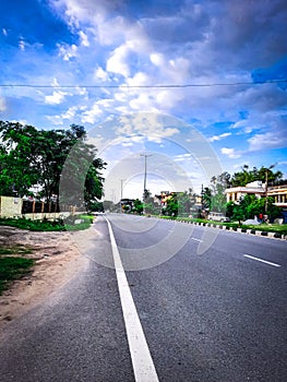 Photo captured during lockdown. Empty National Highway. Cloudy blue sky clear atmosphere...