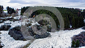 The photo captures a mesmerizing winter landscape as seen from the lofty vantage point of a drone