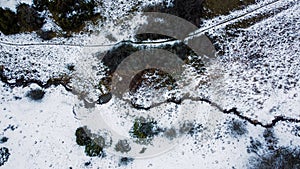 The photo captures a mesmerizing winter landscape as seen from the lofty vantage point of a drone