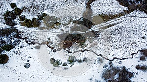 The photo captures a mesmerizing winter landscape as seen from the lofty vantage point of a drone