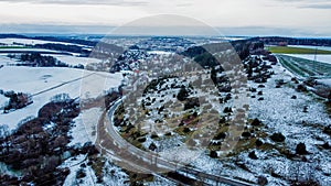 The photo captures a mesmerizing winter landscape as seen from the lofty vantage point of a drone