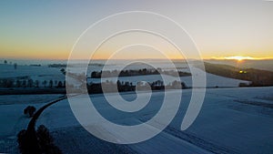 The photo captures a mesmerizing winter landscape as seen from the lofty vantage point of a drone