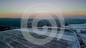 The photo captures a mesmerizing winter landscape as seen from the lofty vantage point of a drone