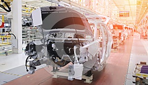 Photo of a car production line. Modern car assembly plant