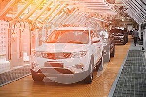 Photo of a car production line. Modern car assembly plant