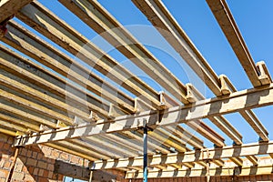 Photo of ceiling formwork construction against peaceful blue sky