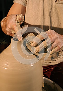 Photo of a ceramic pot maker. photo