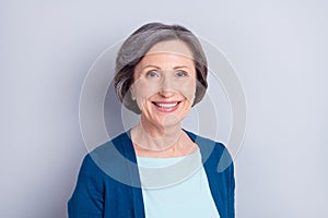 Photo of charming happy nice old woman smile good mood business lady isolated on grey color background