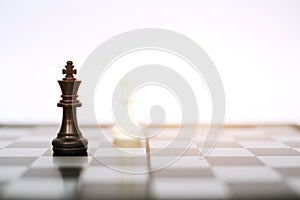 Photo of chess king pawns on the chess board game