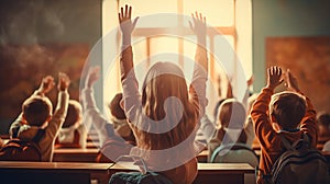 Photo of children participating in a classroom discussion, raising their hands to ask or answer questions