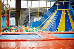 Photo of children`s trampolines made in the game center, a fun and joyful place