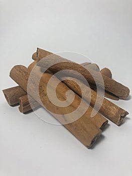 Photo of cinnamons on white background