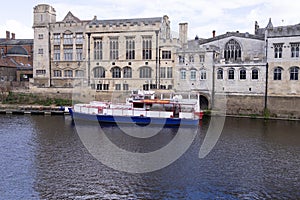 Photo of the city centre of the historic city of York in Yorkshire in the UK showing boats on the River Ouse in the British summer