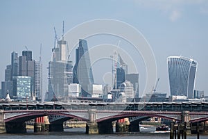 Photo of City of London skyline showing new buildings in the financial district and buildings under construction.