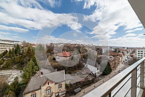 Photo of the city under the blue sky with clouds