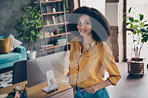 Photo of clever adorable lady specialist dressed shirt smiling enjoying office work indoors workstation workshop