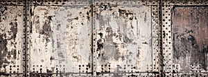 Photo closeup old rusty grunge steel aluminum fragment of protective structure made of metal plates sheets assembled
