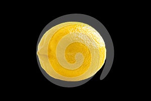 Photo of closeup ripe yellow lemon isolated on black background