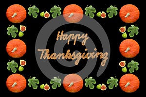 Isolated pumpkins, fig leaves and fruits arranged in a frame with handwriting `Happy Thanksgiving`