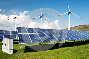 Photo collage of solar panels and wind turbins