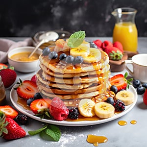 The photo a colorful plate with pancakes and waffles stacked photo