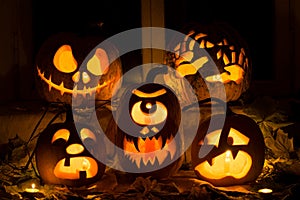 Photo composition from five pumpkins for Halloween.