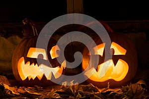 Photo composition from two pumpkins on Halloween.
