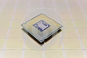 Photo of a Computer Chip CPU put on silicon wafer with microchip