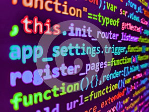 Photo of computer digital background. Software developer programming code on black screen. Developer working on program codes.