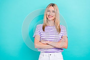 Photo of confidant pretty girlish woman with straight hairstyle wear striped t-shirt hands crossed isolated on blue