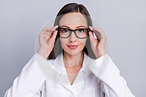 Photo of confident cheerful woman doc dressed white arms glasses smiling isolated grey color background